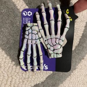 Claire’s iridescent skeleton hair clips
